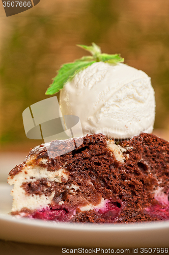 Image of chocolate cake with jam ice cream