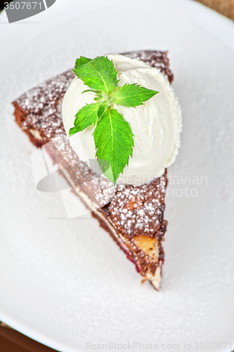 Image of chocolate cake with jam ice cream