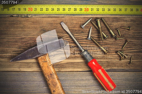 Image of old locksmith tools and screws