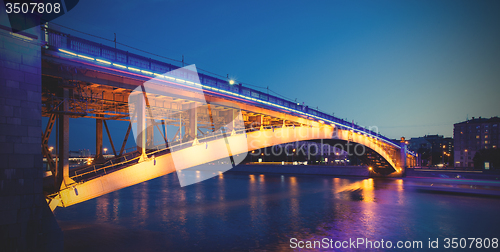 Image of summer evening cityscape with Smolensky Metro Bridge