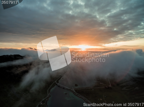 Image of Midnight sun above clouds