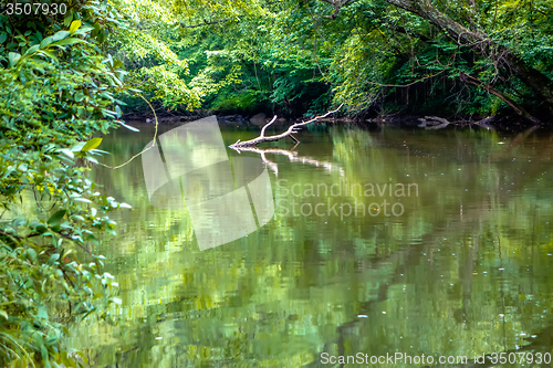 Image of broad river water flow through blue ridge mountains