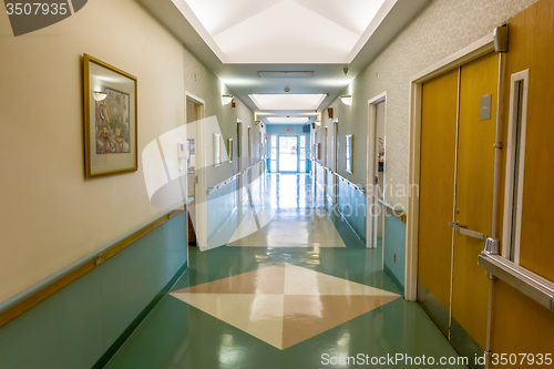 Image of hospital hallway interior architecture and finishes in corridor