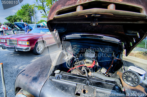 Image of details of old rusty auto at classic car show