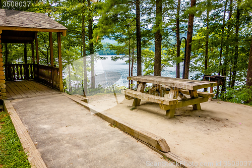 Image of Log cabin surrounded by the forest at lake santeetlah north caro