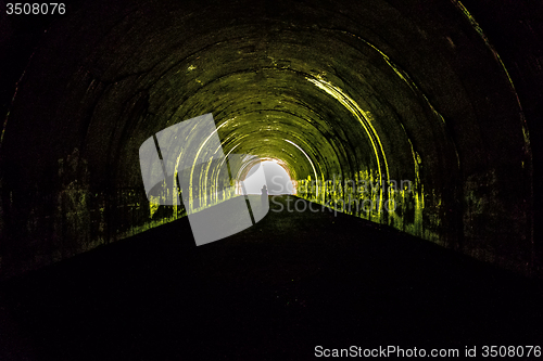 Image of tunnel to road to nowhere at lakeshore trailhead near lake fonta