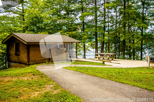 Image of Log cabin surrounded by the forest at lake santeetlah north caro