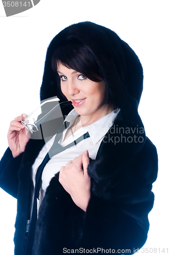 Image of Young attractive woman in fur coat