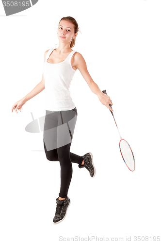 Image of Beautiful girl with badminton racket in hands