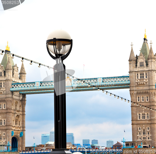 Image of london tower in england old bridge and the cloudy sky