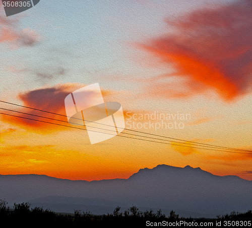 Image of mountain in morocco africa   current cables     and red sunrise