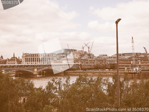 Image of Retro looking Blackfriars bridge in London