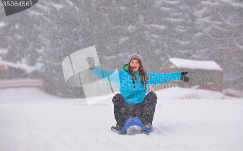 Image of Teen girl on sledge 