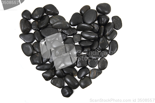 Image of black stones heart isolated
