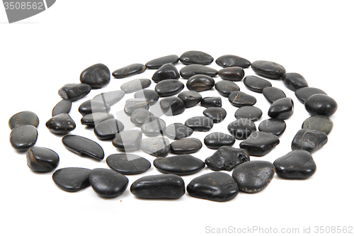 Image of black stones spiral isolated