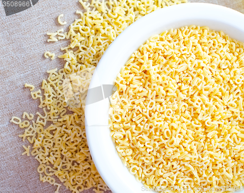 Image of Pasta - alphabet, raw italian pasta in bowl