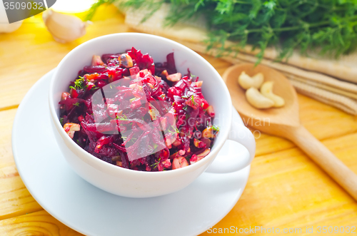 Image of Fresh salad with beet and walnuts, vegetarian salad