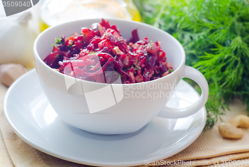 Image of Fresh salad with beet and walnuts, vegetarian salad