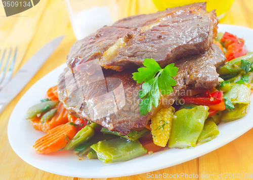 Image of baked meat with vegetables