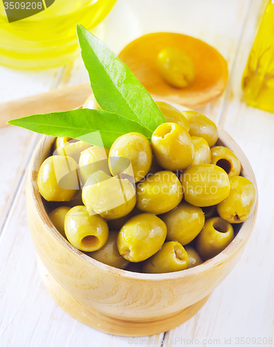 Image of green olives and oil