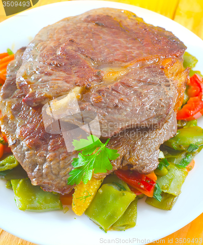 Image of baked meat with vegetables