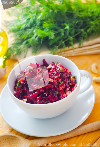 Image of Fresh salad with beet and walnuts, vegetarian salad