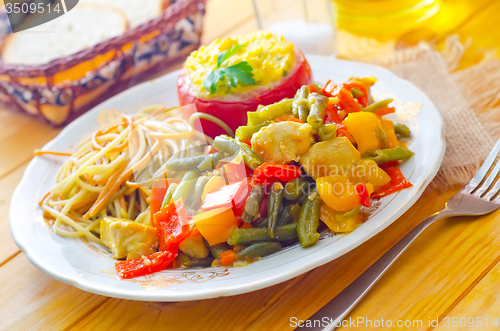 Image of Fresh dinner in the plate, pasta and vegetable stew