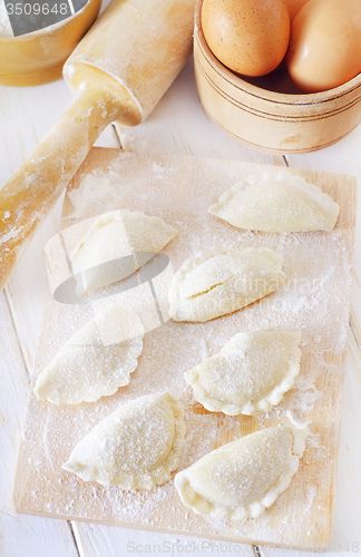 Image of close-up of raw vareniks, traditional ukrainian food