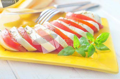 Image of caprese, fresh salad with tomato and mozzarella