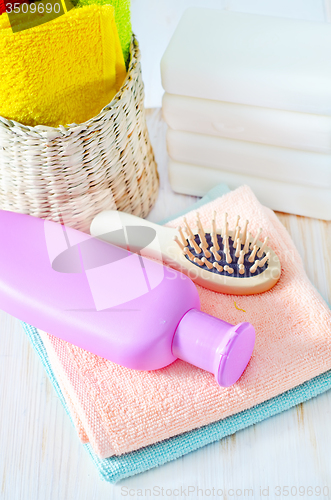 Image of color towels and shampoo