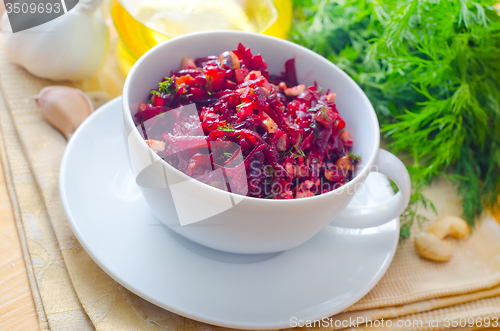 Image of Fresh salad with beet and walnuts, vegetarian salad