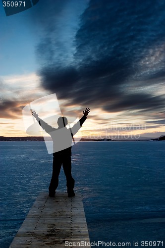 Image of Man on Frozen Lake