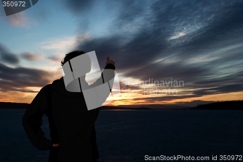 Image of Man on Frozen Lake