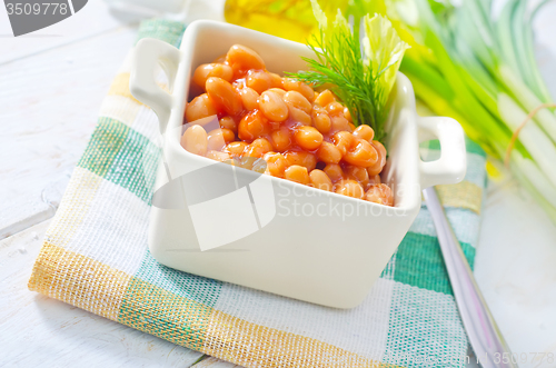 Image of white bean with tomato sauce