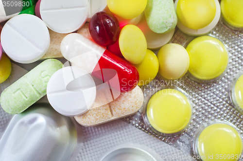 Image of color pills and tablet, the medical means