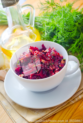 Image of Fresh salad with beet and walnuts, vegetarian salad