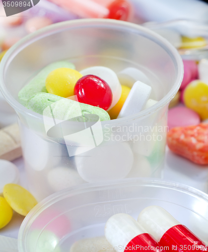 Image of color pills and tablet, the medical means