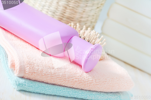 Image of color towels and shampoo