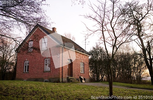 Image of Old Brick House at Sunset