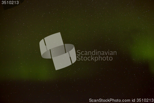 Image of Northern lights with bright stars, Iceland