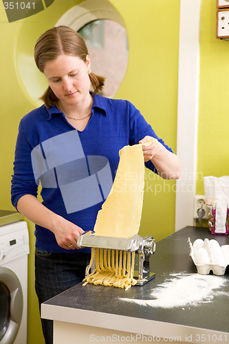 Image of Female making Fettuccine
