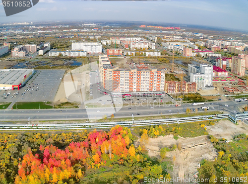 Image of Aerial urban view on residential district at autumn