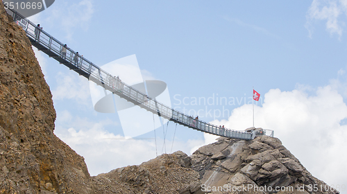 Image of LES DIABLERETS, SWIZTERLAND - JULY 22: People walk at the Glacie