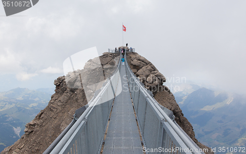 Image of LES DIABLERETS, SWIZTERLAND - JULY 22: People walk at the Glacie