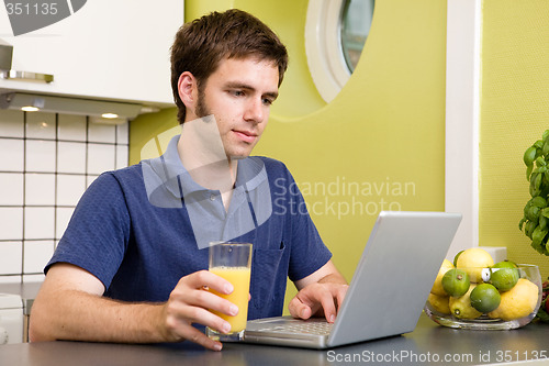 Image of Using Computer with Juice