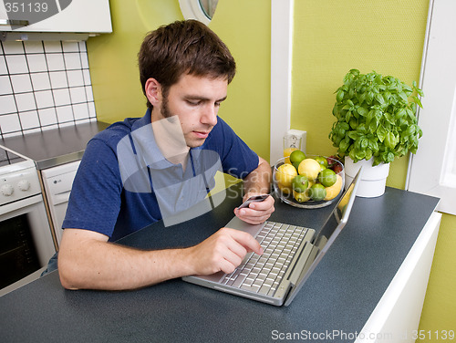 Image of Shopping at Home in Kitchen