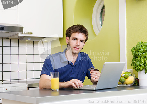 Image of Online Shopping in Kitchen