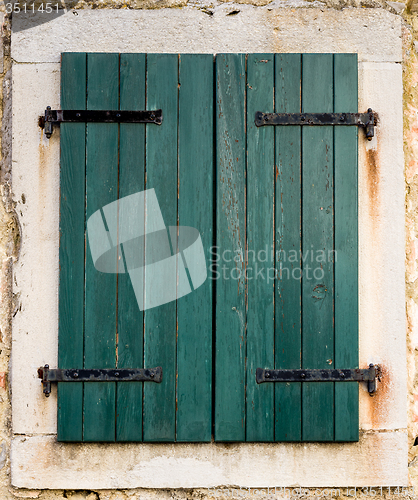 Image of old window with shutters