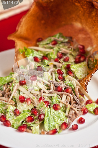 Image of meat and pomegranate salad 