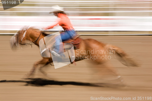 Image of Galloping Horse with Cowgirl